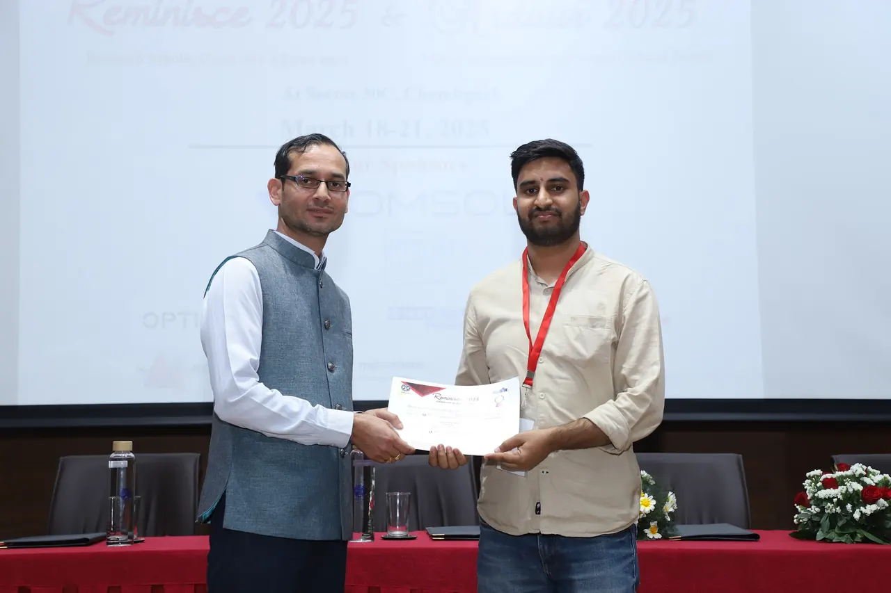 A certificate is presented to a participant