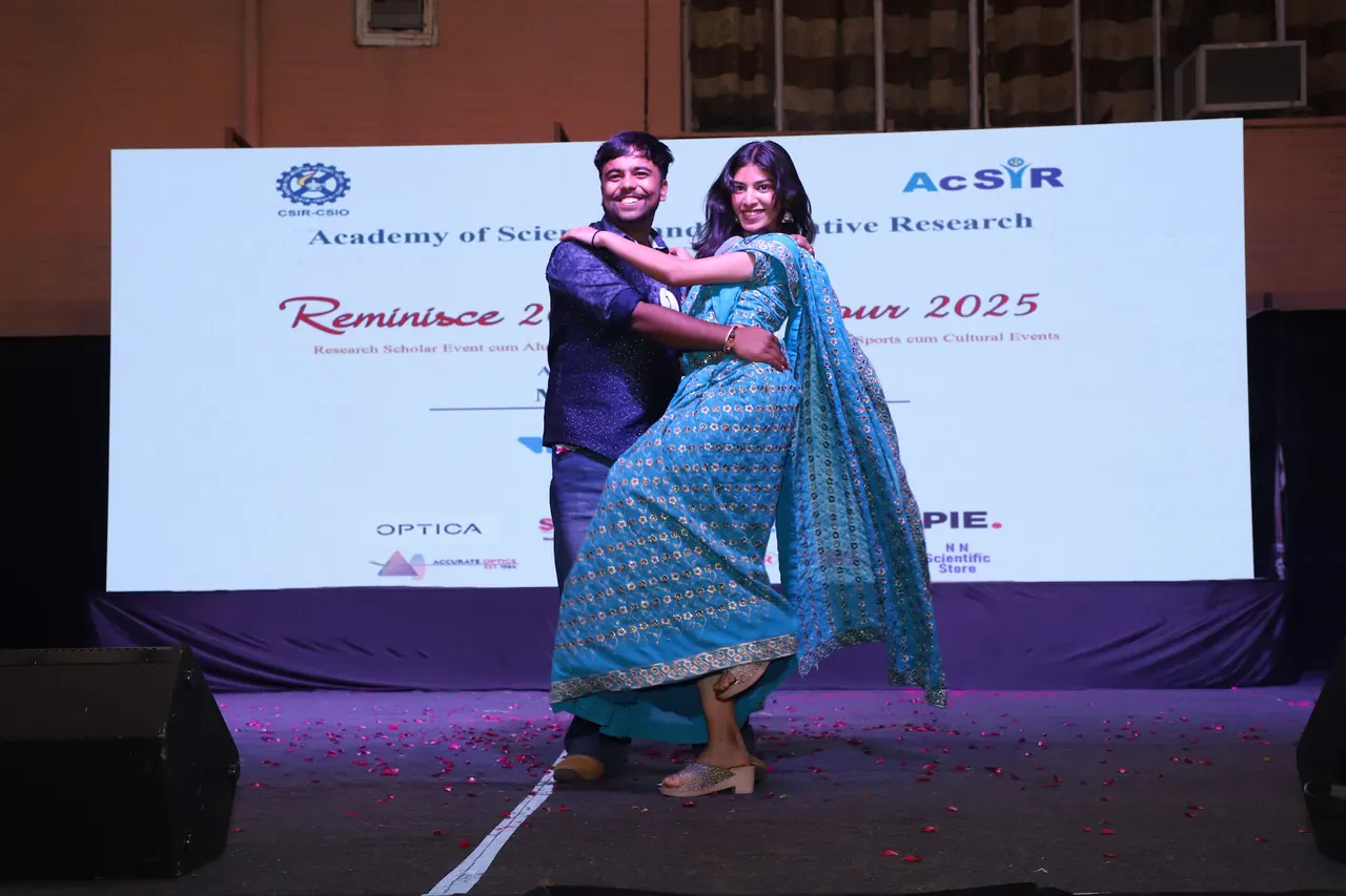 Two participants walk the ramp together
