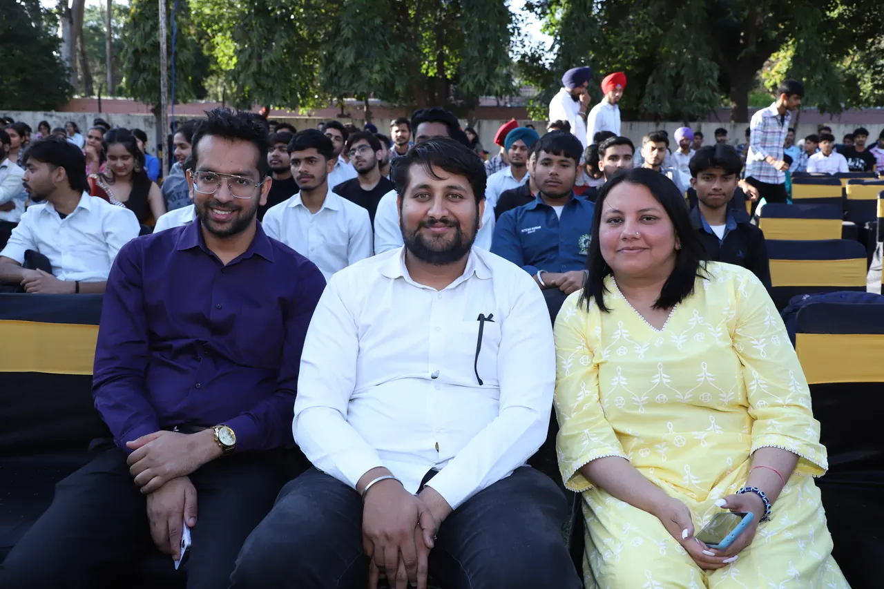 Audience members seated in the front rows
