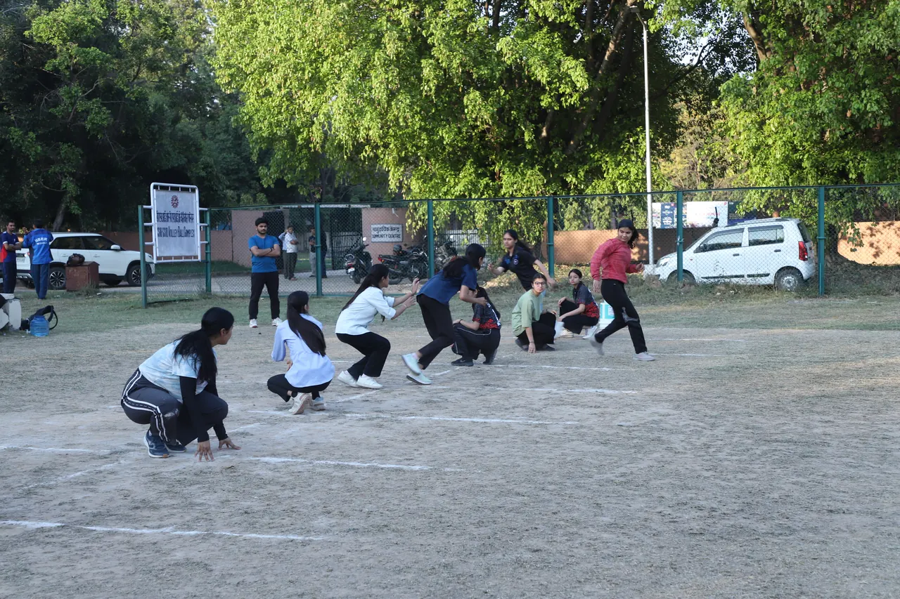 Kho kho players on the outdoor court
