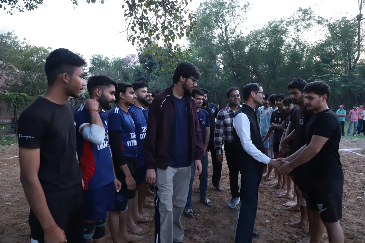 Kabaddi teams line up and shake hands