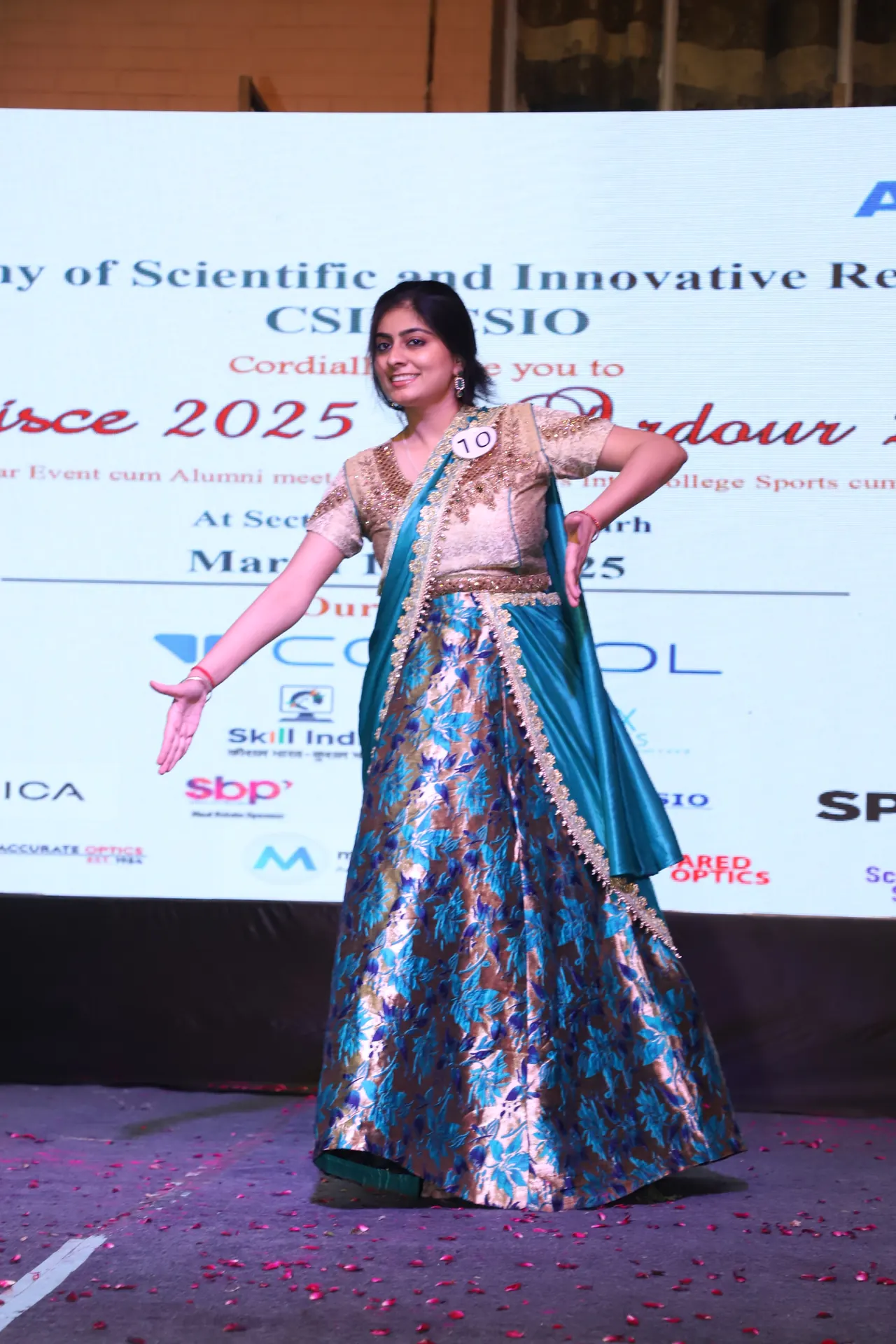 A participant in a blue lehenga on the ramp