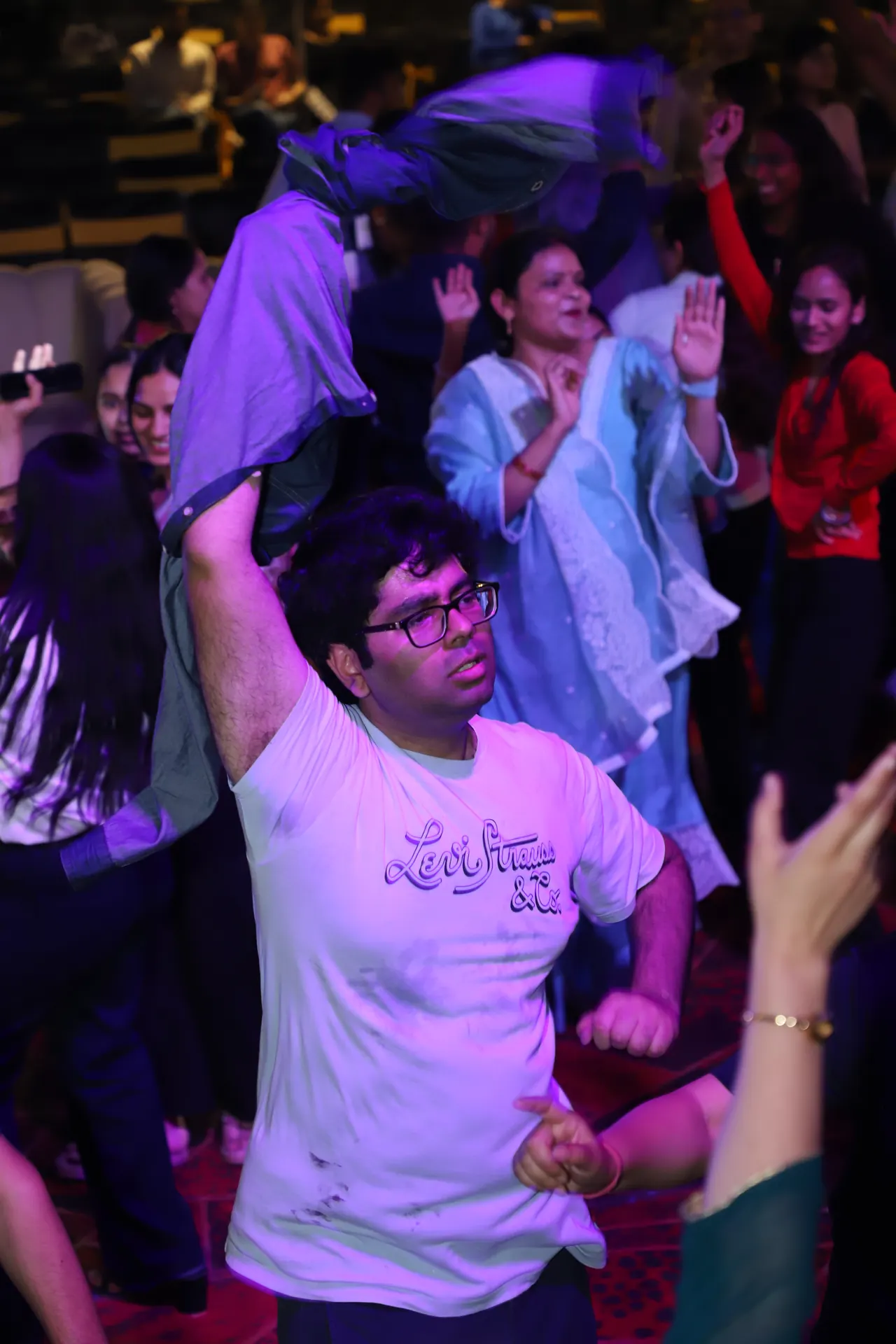 A participant dances in the crowd
