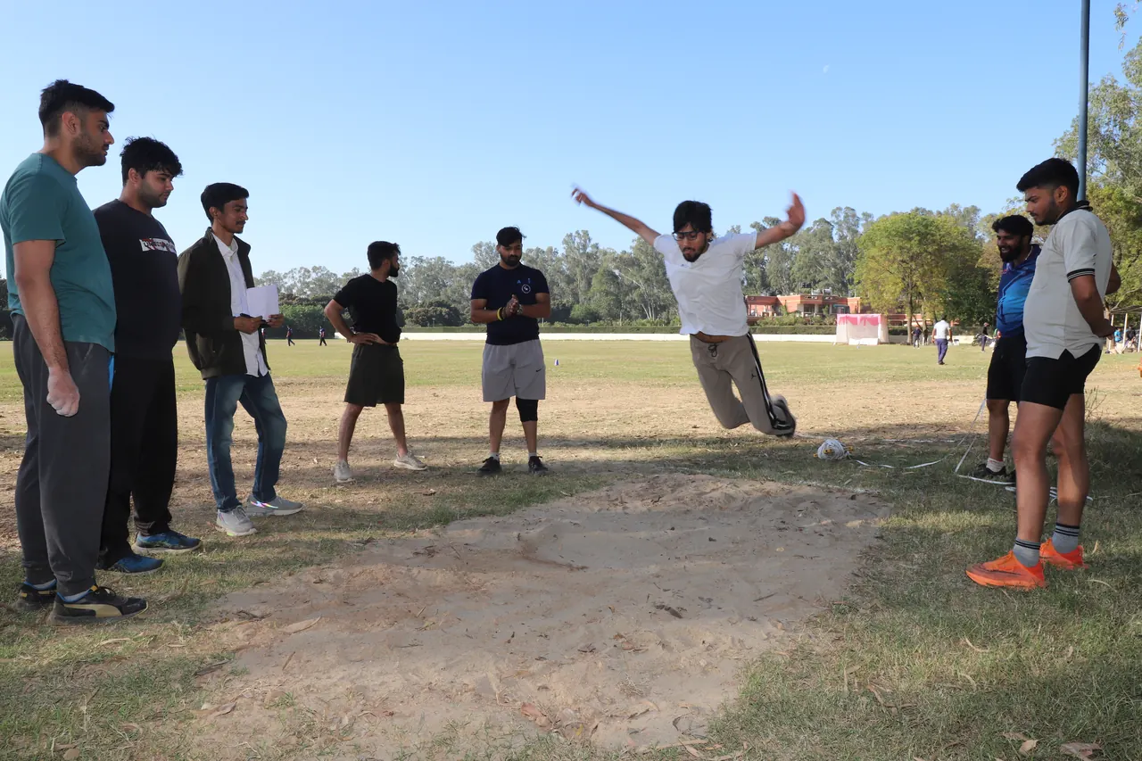 An athlete leaps during a jumping event