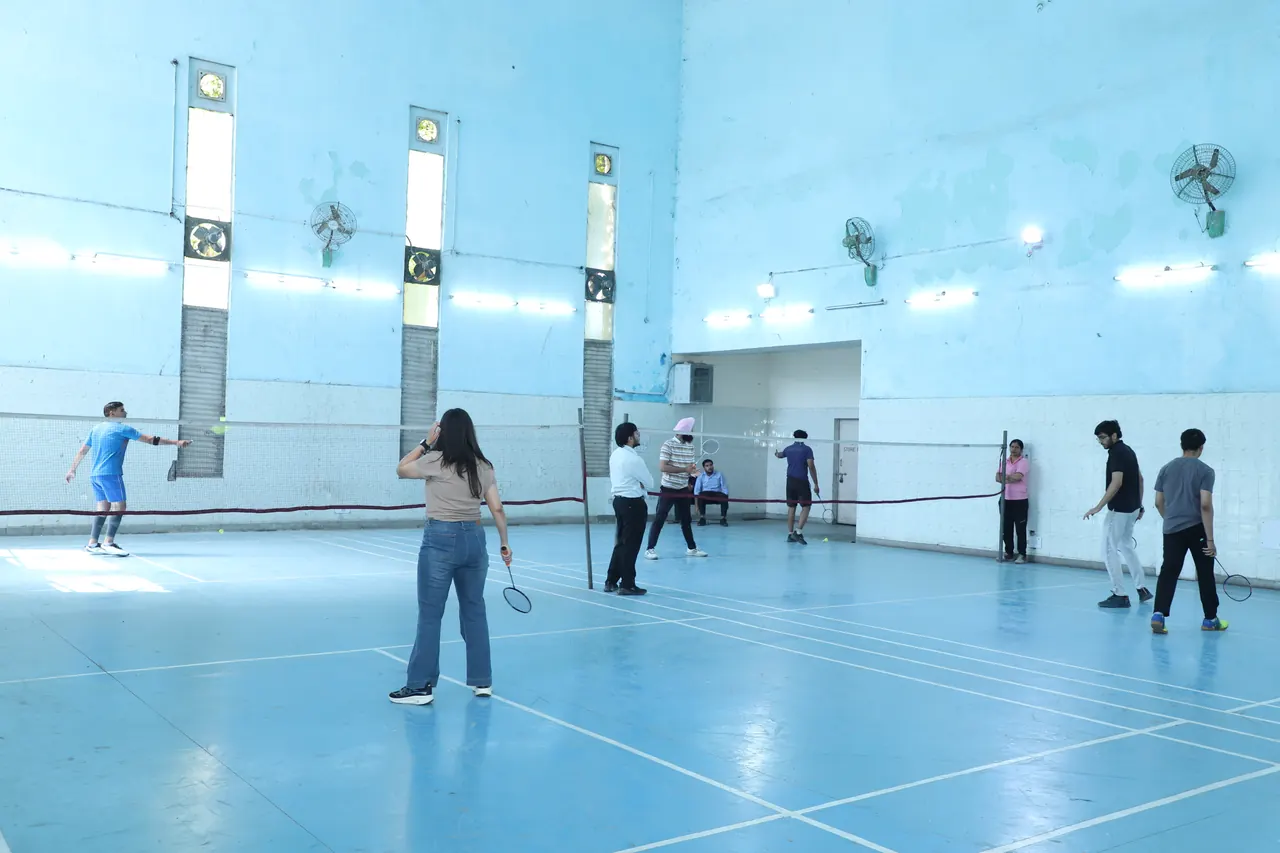 Badminton players on the indoor courts